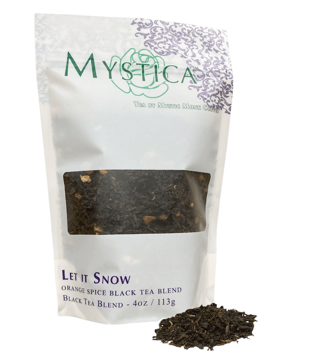Tea package labeled 'Mystica' with 'Let It Snow' tea blend on a white background